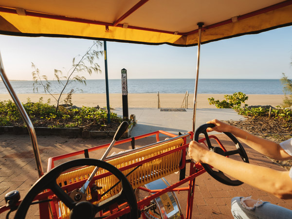 riding an Aquavue Surrey Bike along the Hervey Bay Esplanade