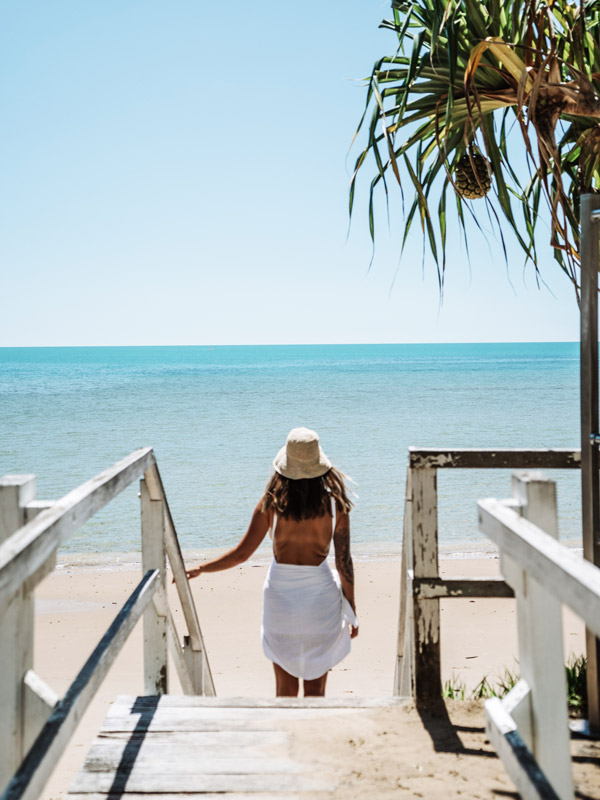 a woman heading down the Torquay Beach, Hervey Bay