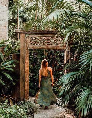 a woman entering the 3. Ikatan Day Spa
