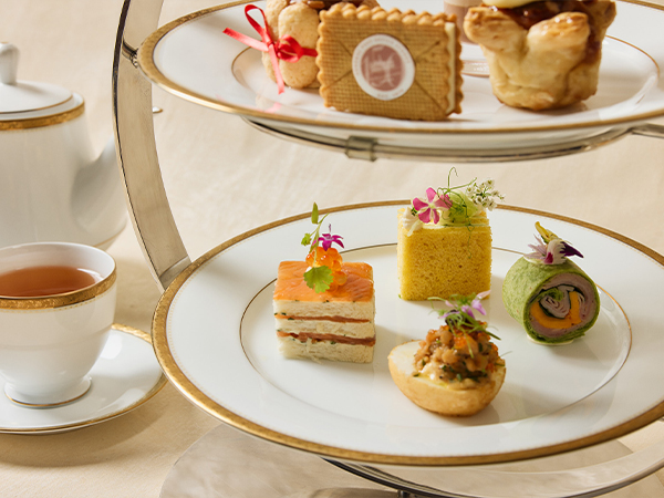 High tea cakes on a plate.