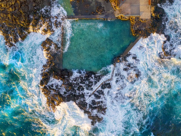 Aerial overlooking Blowhole Point Rock Pool, Kiama. (Image: Destination NSW)