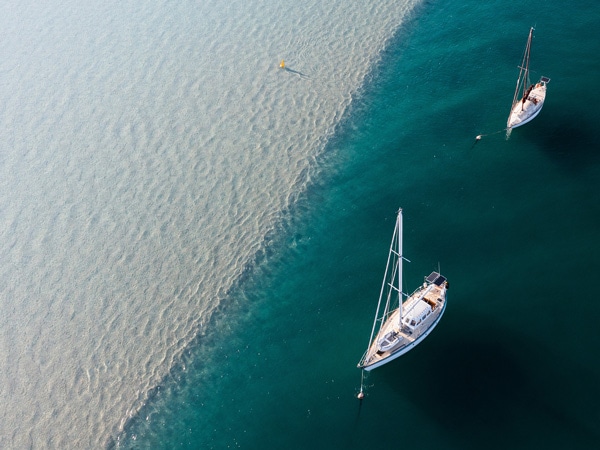 Two boats sailing in Wallis Lake, Tuncurry, Barrington Coast. (Image: Destination NSW)