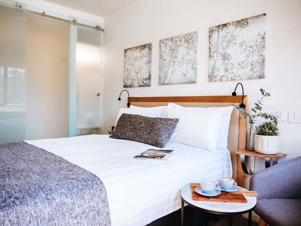 a look inside the bedroom at Astor Inn