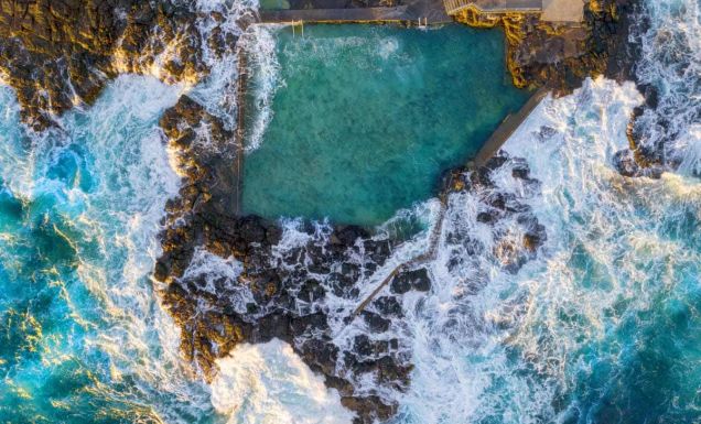 Aerial overlooking Blowhole Point Rock Pool, Kiama. (Image: Destination NSW)