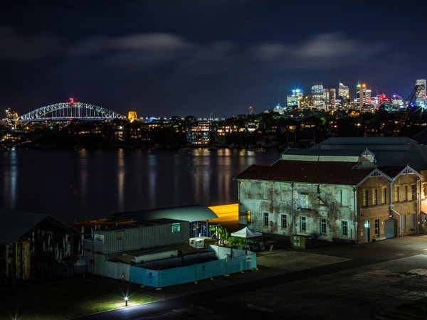 View of the Sydney skyline at night as seen from Cockatoo Island, Sydney. (Image: Destination NSW)