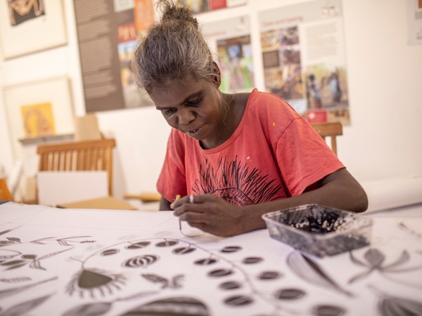 an Indigenous artist at the annual DAAF, Injalak Arts tour with Venture North