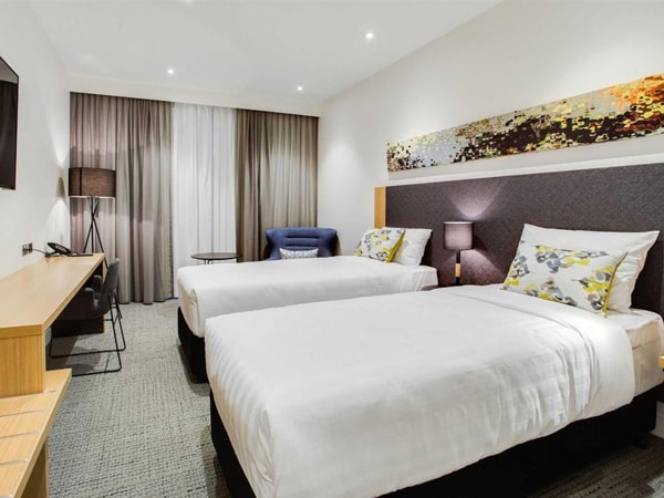 a look inside the bedroom unit at Quality Hotel Rules Club Wagga Wagga