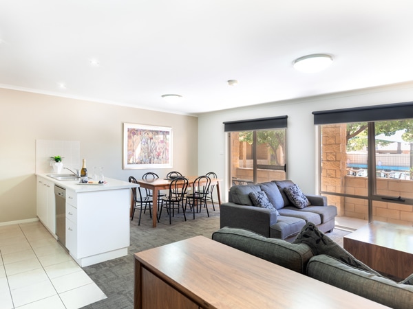 a spacious living and dining area at Quest Wagga Wagga