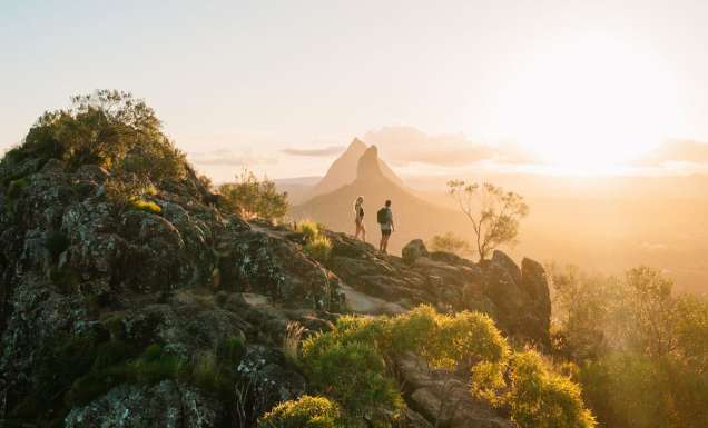 A view of the sun rising or setting over Mount Ngungun in the Sunshine Coast. (Image: Visit Sunshine Coast)
