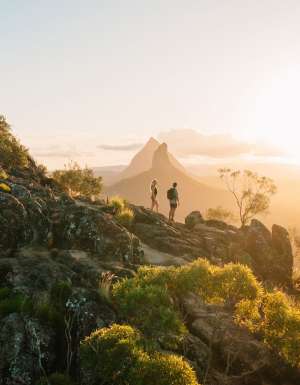 A view of the sun rising or setting over Mount Ngungun in the Sunshine Coast. (Image: Visit Sunshine Coast)