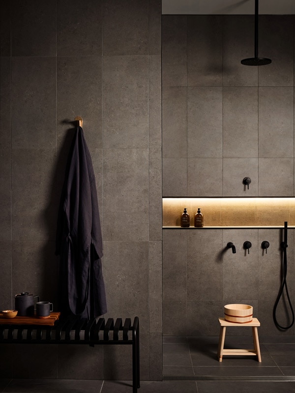 Dark colour scheme bathroom at Comma in Melbourne. (Image: Tess Kelly)