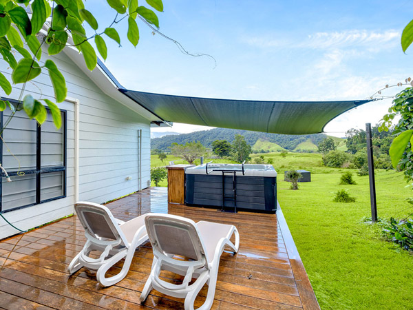 a private deck at Cassowary Falls, Daintree accommodation