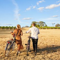 Couple cycling Mudgee vineyards with Tour De Vines