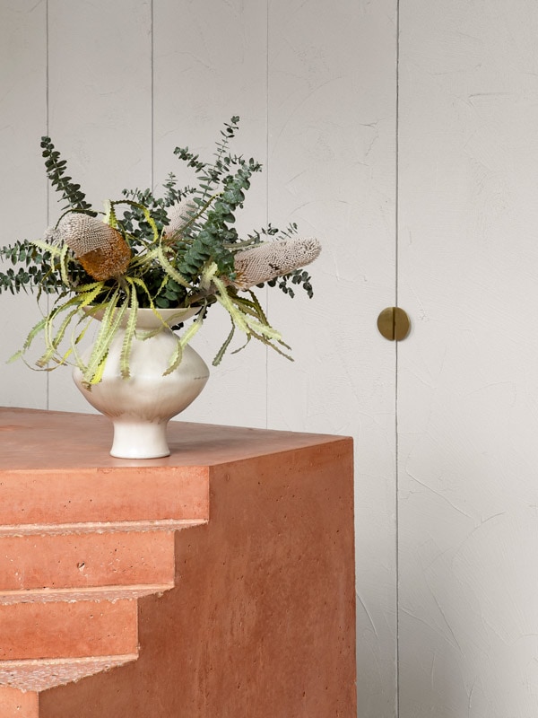 Flowers atop steps at Sense of Self. (Image: Martina Gemmola)