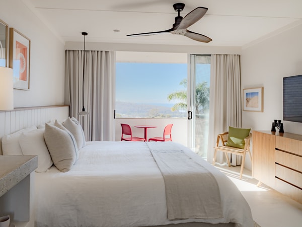 a chic bedroom at Hillcrest Merimbula