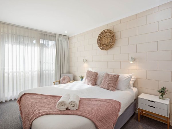 the main bedroom at All Decked Out at Penguin Mews