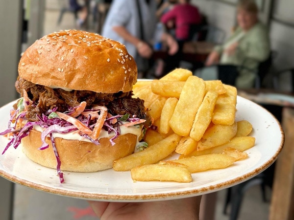 a plate of burger and fries at Mossy Point