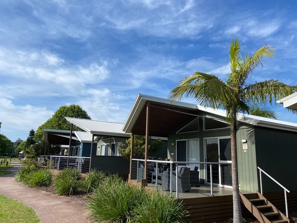 the exterior of cabins with balconies at NRMA Batemans Bay Holiday Resort