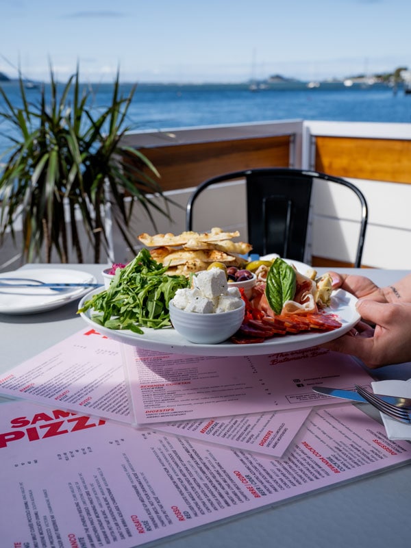a plate of food on the table at Sam's Pizza, Batemans Bay