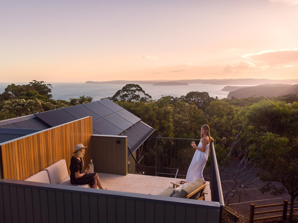 two women hanging out at the sunset deck of Bells at Killcare