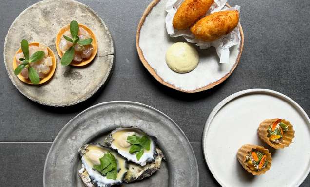Plates of food at Dier Makr restaurant in Hobart.