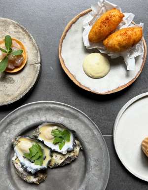 Plates of food at Dier Makr restaurant in Hobart.