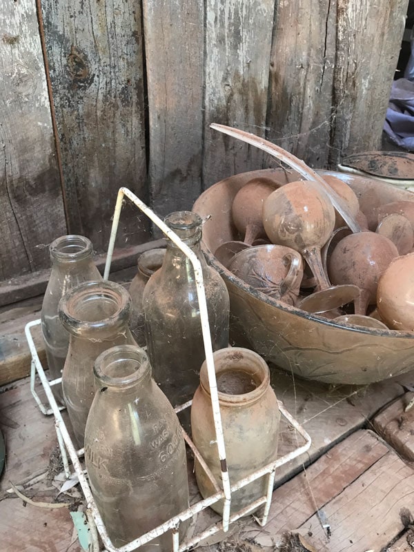 Empty bottles and old glasses are ready for upcycling at Callubri Station, NSW Australia