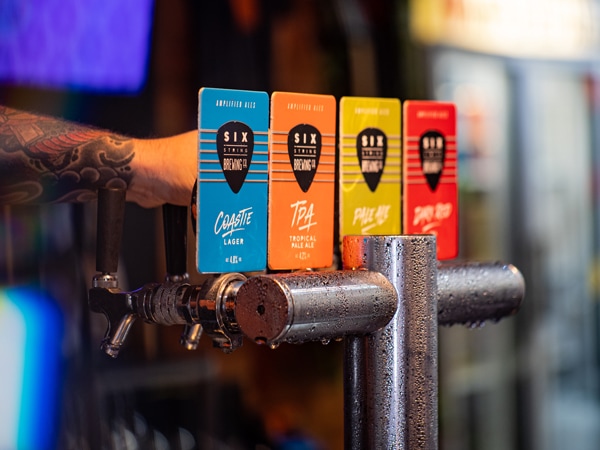 A close-up of the taps at Six String Brewery in Central Coast, Australia
