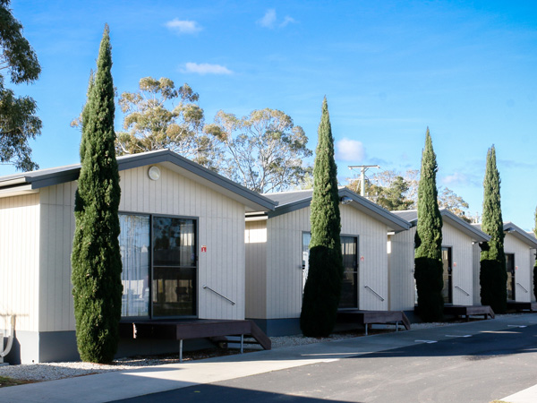 a row of cabins at BIG4 Hobart Airport Tourist Park