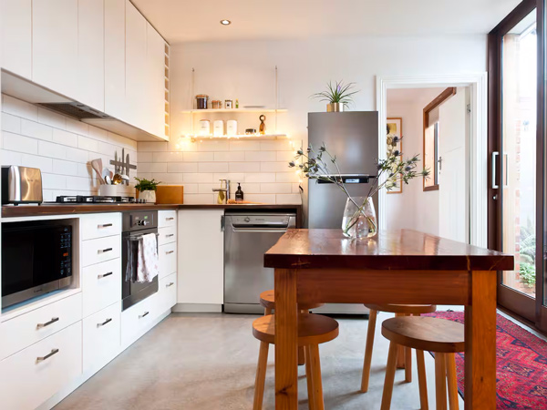 the dining and kitchen at The Pickers’ Cottage, Hobart