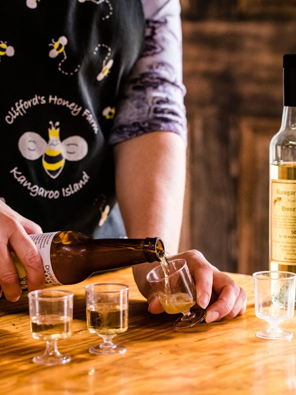 Clifford's Honey Farm honey alcohol pouring