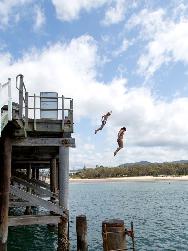 Jumping off the Coffs Harbour Jetty.