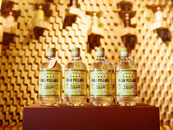 a array of Four Pillars Gin bottles on display