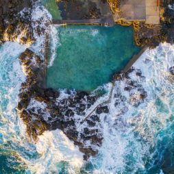 Aerial overlooking Blowhole Point Rock Pool, Kiama