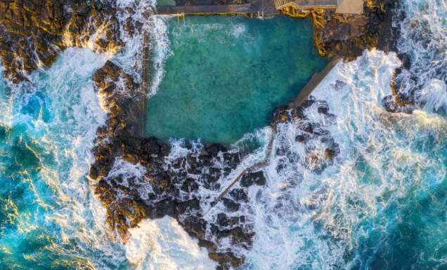 Aerial overlooking Blowhole Point Rock Pool, Kiama