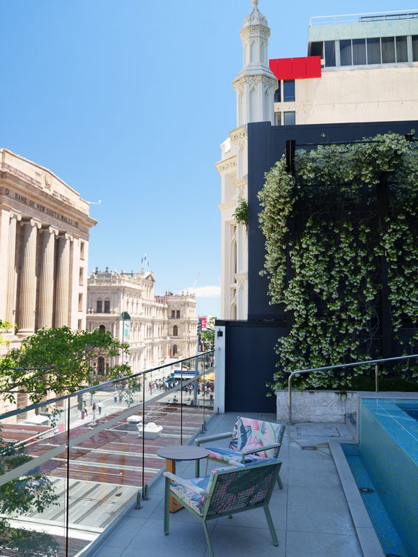 an empty chair at The Pool Terrace at Hyatt Regency Brisbane