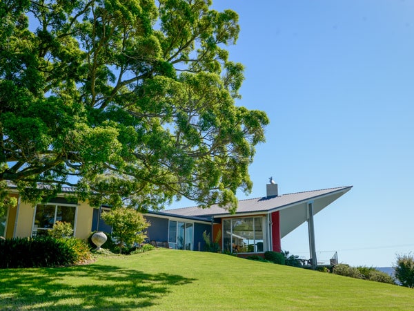 Mt Hay Retreat on a green hill.