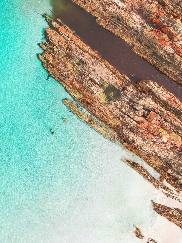 Aerial view of Snelling Beach and the rocks.