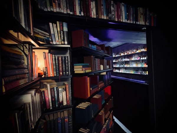 Fun speakesy bar with hidden bookshelves in Bundaberg