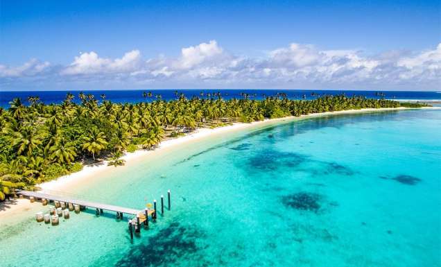 Crystal clear waters of the Cocos (Keeling) Islands with jetty