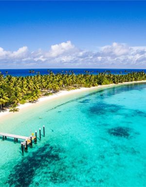 Crystal clear waters of the Cocos (Keeling) Islands with jetty