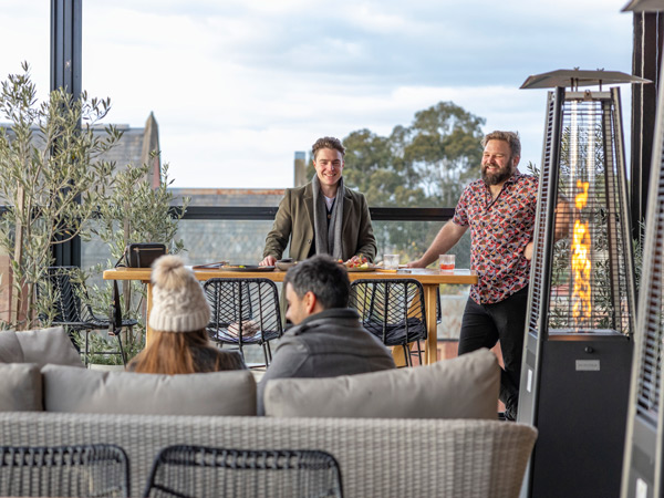 friends hanging out at Nimbus Rooftop bar, Bendigo
