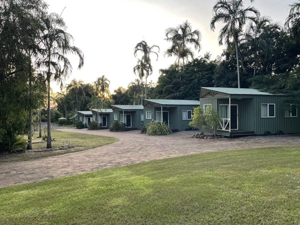villas lined up and surrounded by trees in Darwin Boomerang Motel and Caravan Park