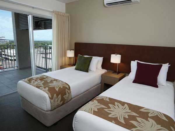 studio-type accommodation with two single beds at Quest Palmerston, Darwin