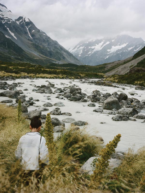 New Zealand mountainscape with person in the forefront