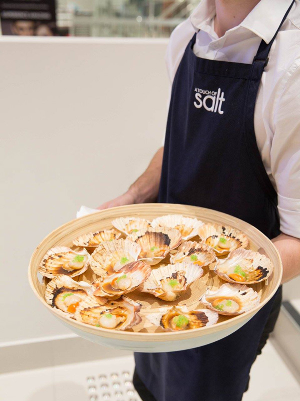 a waiter holding a platter of scallops, A Touch of Salt, Townsville
