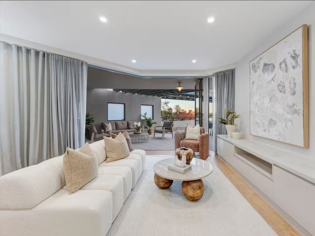 A neutral coloured living room in an Airbnb