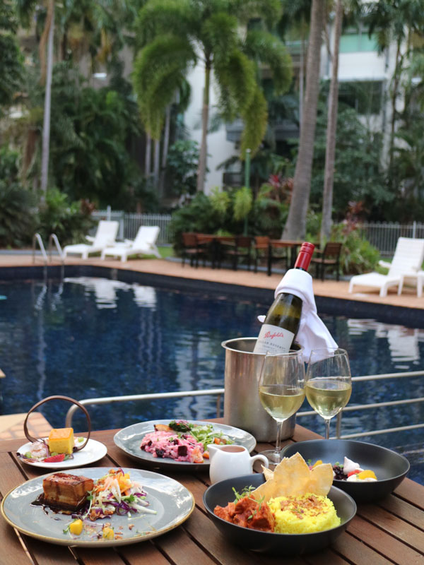 food and drinks by the pool at Hilton Darwin