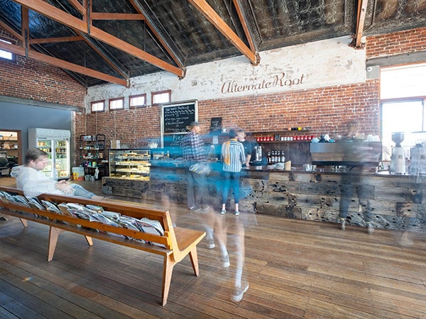 Patrons purchasing food and drink at The Alternate Root Cafe, Uralla