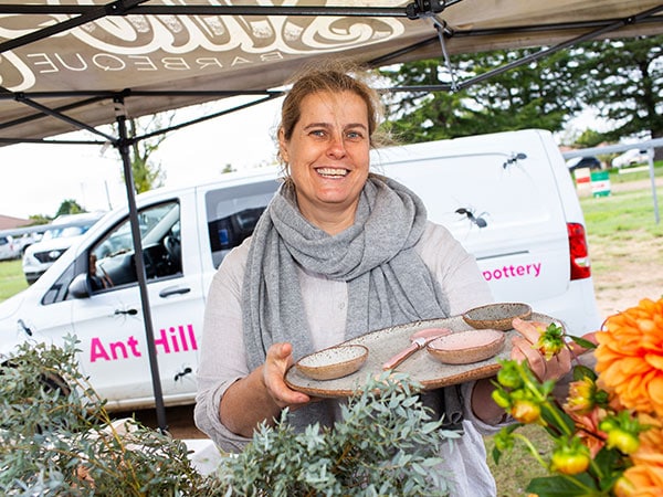 A stallholder at Seasons of New England event in Uralla.